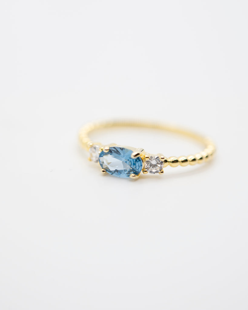 Evie Ring Rings Jewelry Design Group 6 Blue Topaz CZ 